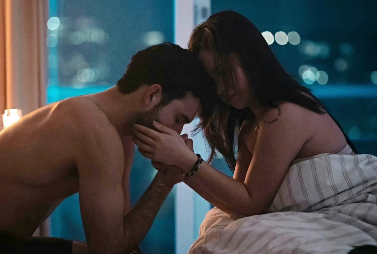 Man and woman in bedroom