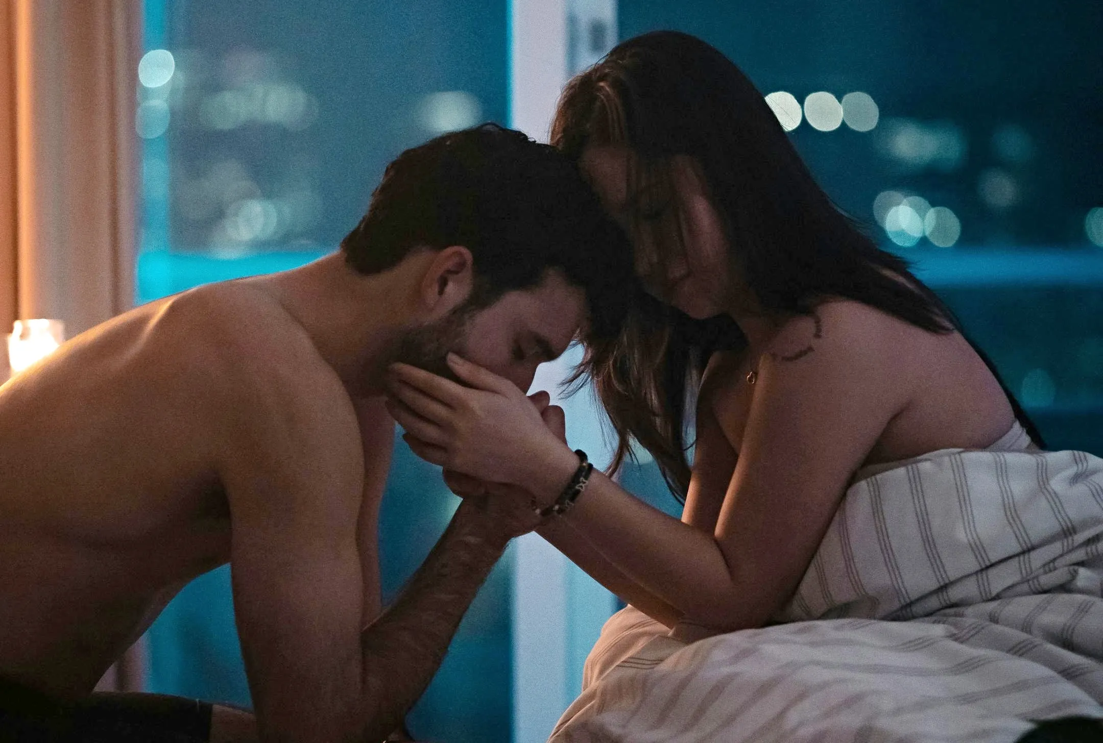 Man and woman in bedroom